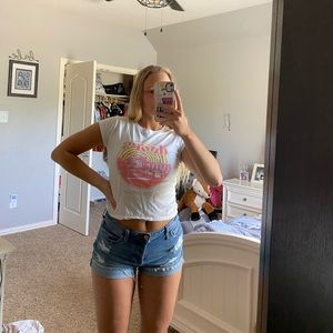 white band tee with pink graphic